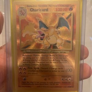 Pokemon Celebrations Gold Metal Charizard Card 4/102 Ultra Premium Collection.